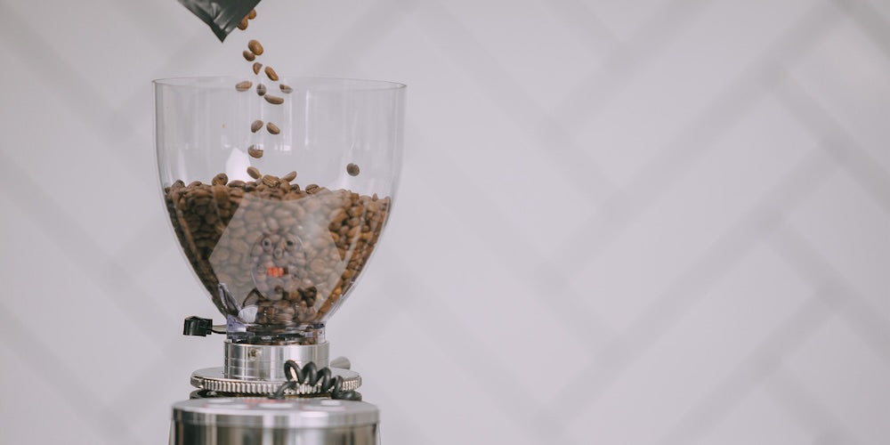 Person preparing coffee after freezing coffee beans