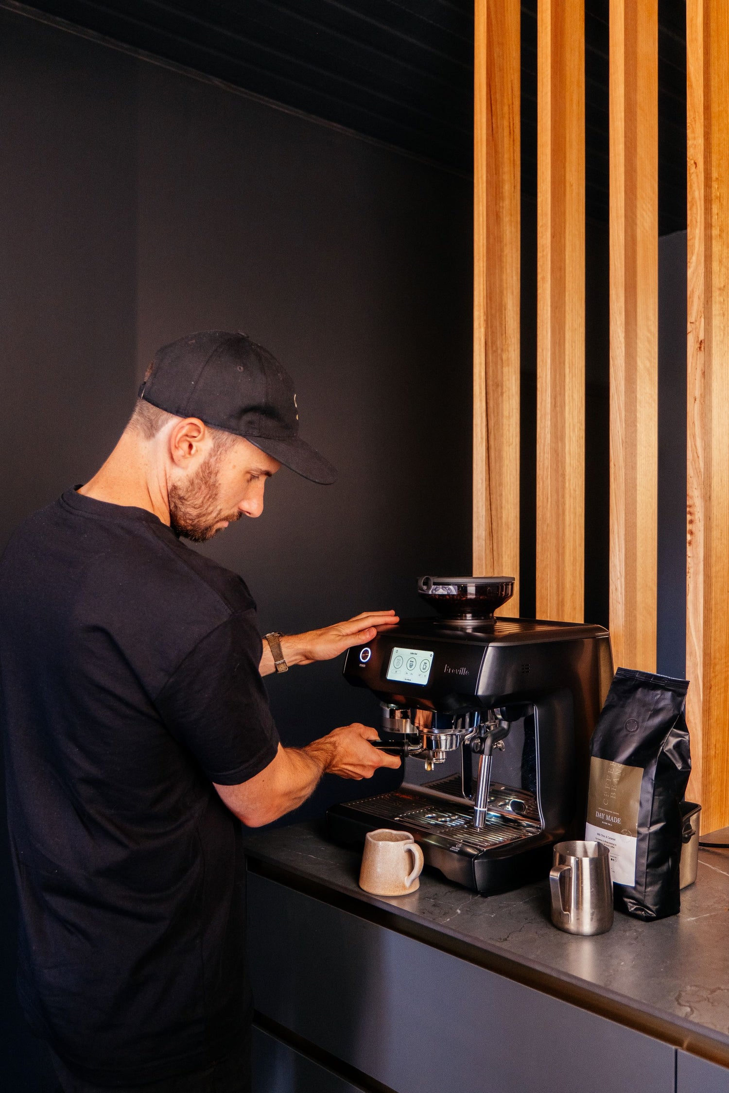 Cal demonstrating how to use brewing equipment