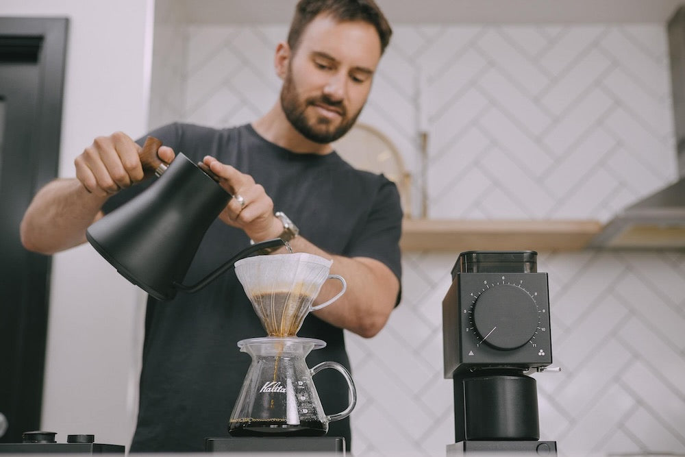 Man pouring coffee that he bought as part of the Coffee Beans Perth coffee subscription