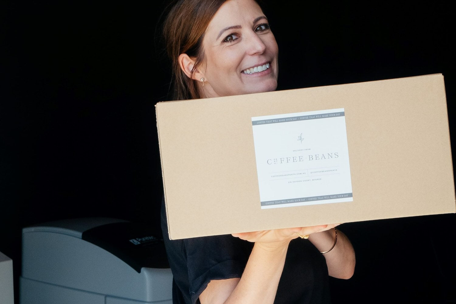 Jess delivering wholesale coffee in Perth